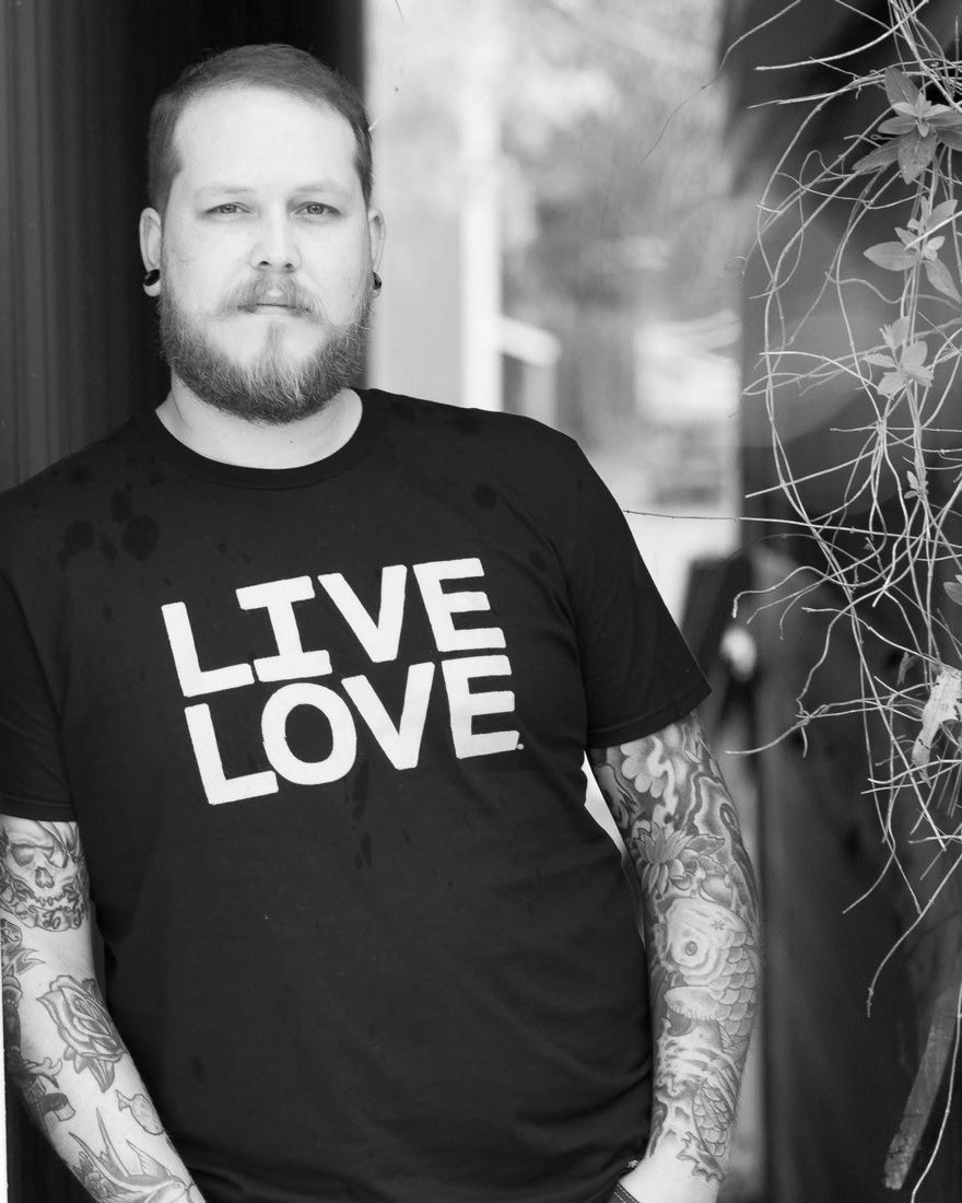 Drew in a LIVE LOVE t-shirt